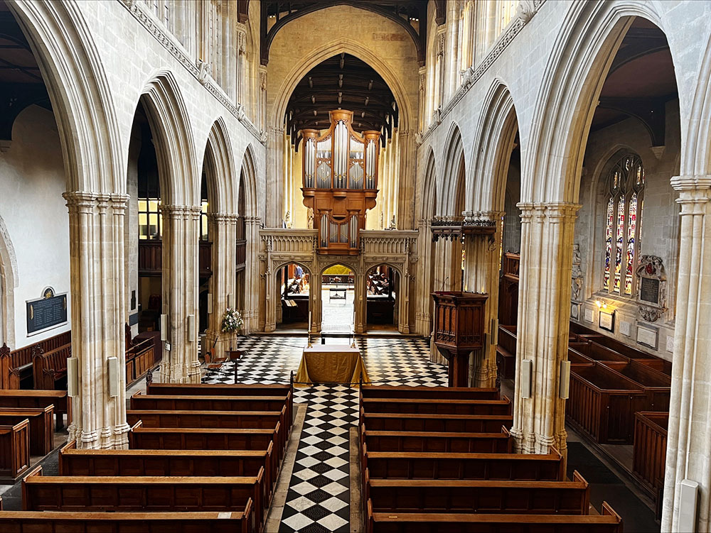 The vaulted stone interior of the University Church, showing the altar
